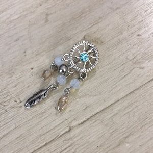 Reversed dream catcher belly ring